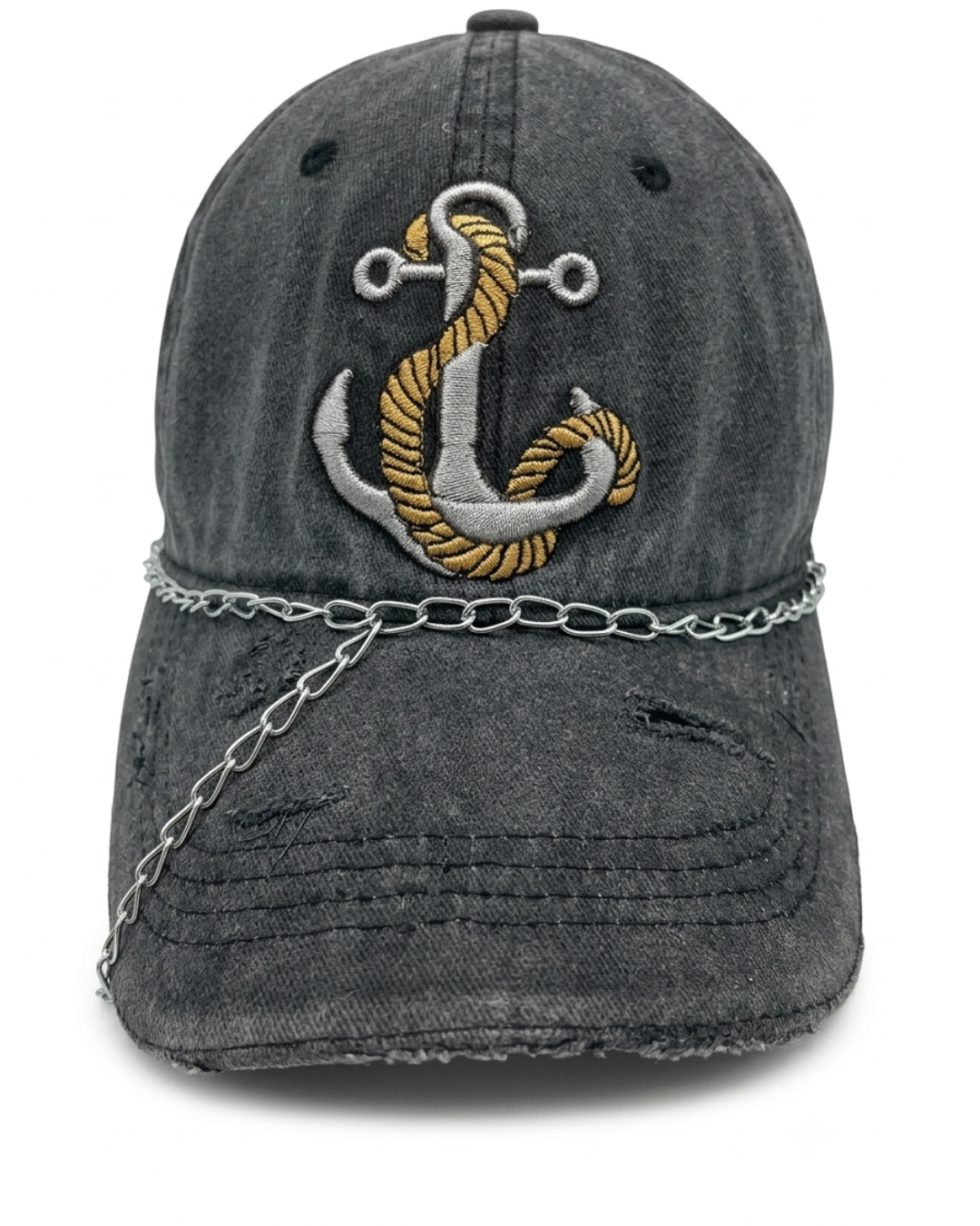 A distressed dark gray washed baseball cap featuring a large embroidered anchor on the front with gold and silver thread, a silver chain draped across the brim, and distressed details on the brim.
