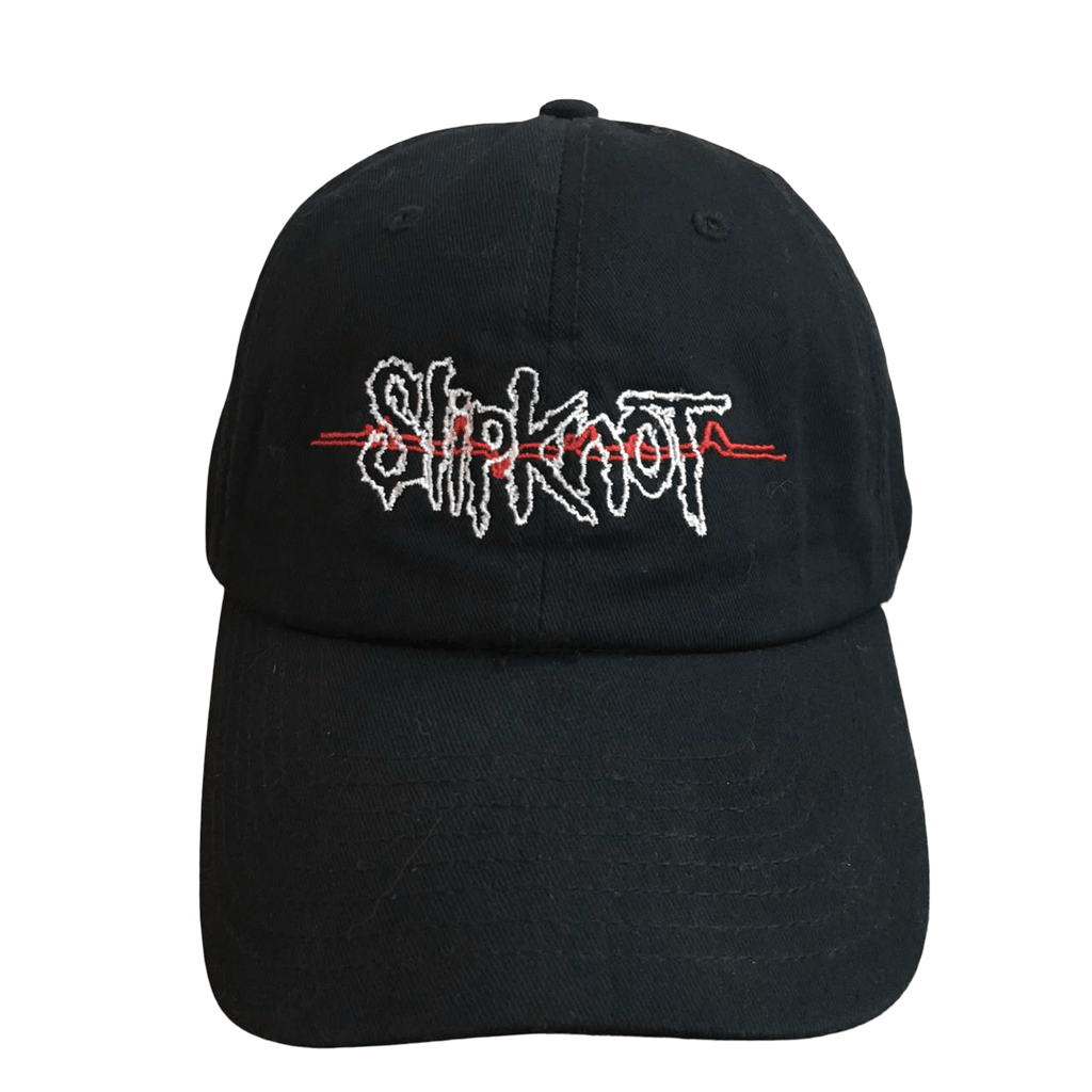 A black baseball cap featuring the Slipknot band logo embroidered in white across the front, with a red heartbeat line running through the logo, set against a plain white background.