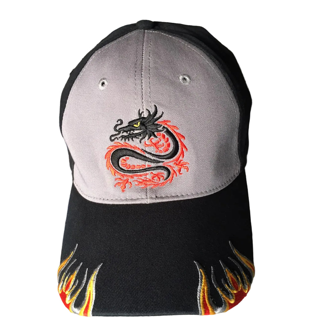 A baseball cap with a light gray front panel, black brim and back panels, featuring an embroidered black and red dragon on the front and red and yellow flame embroidery on the brim.