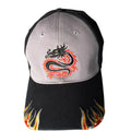A baseball cap with a light gray front panel, black brim and back panels, featuring an embroidered black and red dragon on the front and red and yellow flame embroidery on the brim.